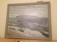 Frontal view of the oil painting showing the seascape, waves, boats, and island with the frame.