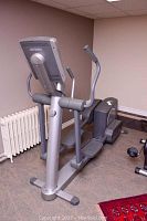 Front right view of full elliptical machine in room
