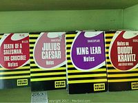 Photo of four Coles Notes booklets on a shelf: Death of a Salesman/The Crucible, Julius Caesar, King Lear, Notes on Duddy Kravitz and Other Works