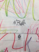 Close-up of Nathan Billitier's autograph with number 6 on the white hockey sock.