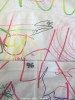 Close-up of autograph and number 96 on the sock.