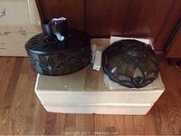 Motor housing unit and stained glass upper shade and dome on top of box