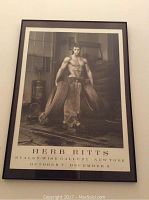 Front view of Staley-Wise Gallery print showing male model holding tires