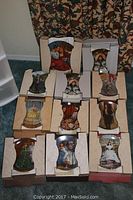 Overview of 11 Bradford Exchange collectible plates in boxes featuring Gone With The Wind scenes.