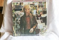 Front view of Tom Petty and The Heartbreakers' 'Hard Promises' new sealed vinyl album in shrink wrap