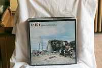 Vinyl record album 'Rush - A Farewell to Kings' with scenic ruin cover art, part of the hard rock collection.