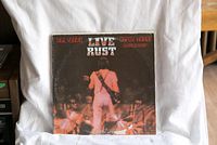 Live Rust album cover showing Neil Young performing live.