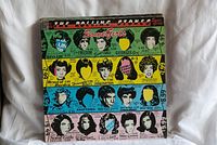 Front cover of Some Girls vinyl album showing colorful pop-art faces and text