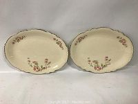 Two Homer Laughlin Virginia Rose ceramic platters, front view showing floral pattern and scalloped edges.