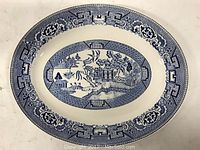 Full view of the Homer Laughlin Blue Willow platter showing the entire pattern and shape.