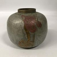 Front view of the small round cloisonné vase showing red floral motif on silvered metal surface.