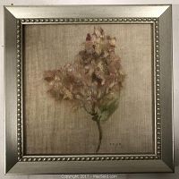 Front view of framed print of still life flower with silver metallic frame showing the entire artwork and signature 'BLUM' in lower right corner.
