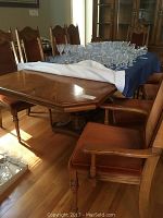 Overall view of table and chairs with glassware on top