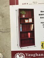 Photo of the boxed Vaughan Wood bookcase front label showing dimensions (72x28x12 inches) and mahogany finish.