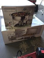 Two Commercial chafing dish boxes stacked, showing product images of both 5 quart and 9 quart chafing dishes.