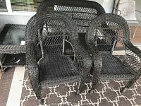 Front overview of love seat, two chairs and side table