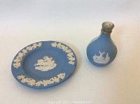 Miniature Wedgewood Glenfiddich Scotch bottle and matching ashtray on neutral background showing details