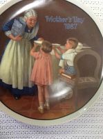 Front view of 'Mother's Day 1987' Norman Rockwell collector plate with children and elderly woman illustration.