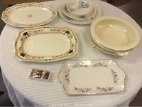 Multiple ceramic serving dishes including Crown Devon bowl, Mott's China tray, Staffordshire Duchess Royal bowl, unmarked oval plate, Royal Staffordshire tiered plate with missing metal supports and visible crack on bottom plate.