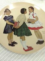 Front of one of the Norman Rockwell collector plates showing the artwork of children.