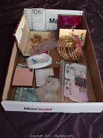 Full lot in cardboard box showing all costume jewelry and accessories, including bangles, boxed items, and mirrors
