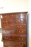 Full front view of the Drexel 6-drawer dresser showing brass handles and keyhole on one drawer.