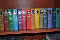 Full set of 14 colorful volumes of Readers Digest Best Loved Books for Young Readers with slipcovers.