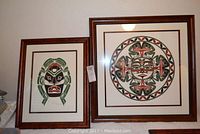 Both framed lithographs displayed together, showing respective sizes and matting.