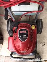 Top view of red Briggs & Stratton engine housing showing 6.75 gross torque label