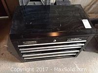 Full view of black Mastercraft Maximum tool chest with four drawers.