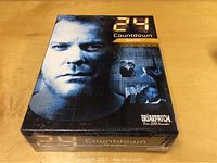 Sealed '24 Countdown' board game box showing front artwork with main character from TV series 24.