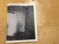 Photo of the front cover of the black and white exhibition catalog booklet for Irene Whittome from 1975-1980 showing a high contrast architectural photograph