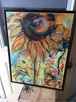 Full front view of the framed sunflower painting, showing details and colors.