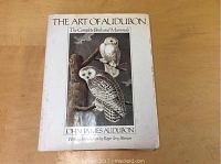 Front cover of the book featuring owls and title 'The Art of Audubon: The Complete Birds and Mammals' by John James Audubon with introduction by Roger Tory Peterson.