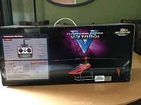 Box of Flybarless Series V370D01 remote controlled helicopter, showing front panel with helicopter image and technical details.