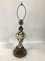 Full view of the Italian ceramic lamp showing entire lamp, harp, and base.