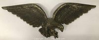 Full frontal view of the brass eagle wall hanging showing the full wingspan and detailed body