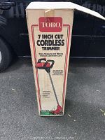 Box of Toro 7 inch cut cordless trimmer showing brand and product type