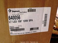 Close-up of product label on the box showing Pentair branding, model number 640056, LT LED 150' 120V SPA.