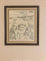 Framed pencil sketch of a bearded sailor in raincoat holding a ship's rigging, showing overall artwork and frame.