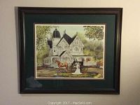 Framed print showing the overall piece hung on a wall with a dark wooden frame and matted border.