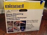 Box front showing the brand Bissell and text Deep Cleaning Machine with usage images