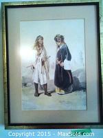 Photo of framed print showing two men in traditional dress outdoors