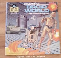Cover of the Star Wars Droid World book showing C-3PO and R2-D2 with a space background and title text