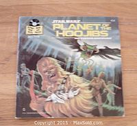 Front cover of the Star Wars Planet of the Hoojibs read-along book showing illustrated Star Wars characters and series title.