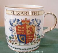 Front side of the commemorative mug with 'ELIZABETH II' above colorful royal crest, dated 1953.