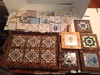 Top view of ceramic tiles, wooden framed trivets, and wooden tray with ceramic inserts.