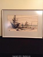 Original signed watercolour landscape painting, framed and hung on wall.