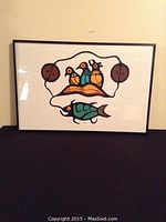 Full framed print showing stylized fish and birds composition