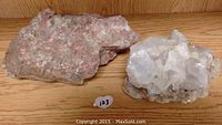 Two specimens side by side on wooden surface: one rough pink granite stone with mineral patches and a large white crystalline rock cluster.